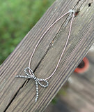 Faux Navajo Pearl Bow Necklace's